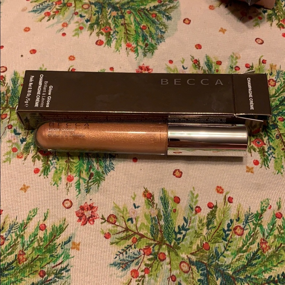 Becca glow gloss / Champagne Creme shade
